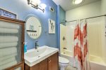 Full tub shower bathroom coastal style